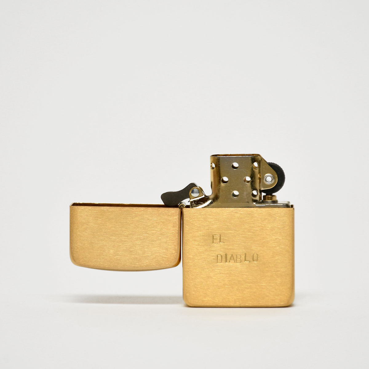 CURRICULUM - BRASS LIGHTER - EL DIABLO